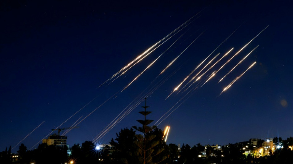 Iran missiles kill 10 in Israel in night of mutual attacks