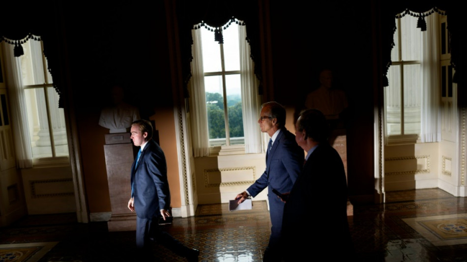 Global stocks mixed as markets track US trade deal prospects