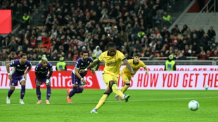 Leao double fires AC Milan past livid Fiorentina and top of Serie A