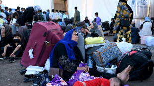 Les Afghans chass&eacute;s d'Iran, de retour avec "rien du tout"