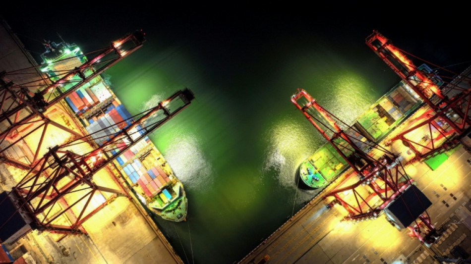 Stocks gain on China-US truce, before key inflation data