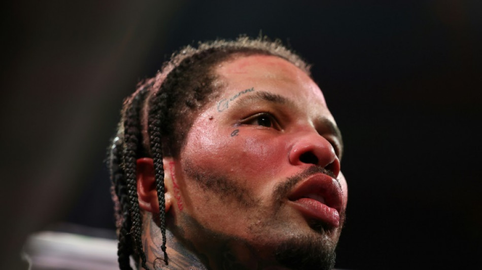 Domestic violence charges dropped against boxing champ Davis