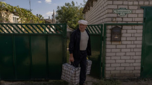 Ucranianos fogem de 'cidade fantasma' que a R&uacute;ssia tenta recapturar