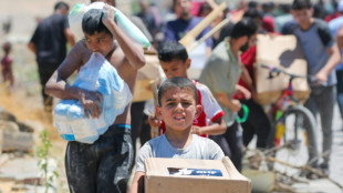 Gaza aid sites shut, as Israel issues 'combat zones' warning