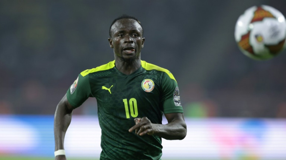 Injured Mane still in Munich ahead of World Cup opener: source