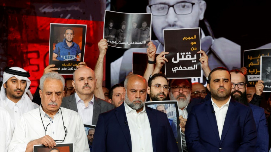 Al Jazeera journalists hold vigil for staff slain in Gaza
