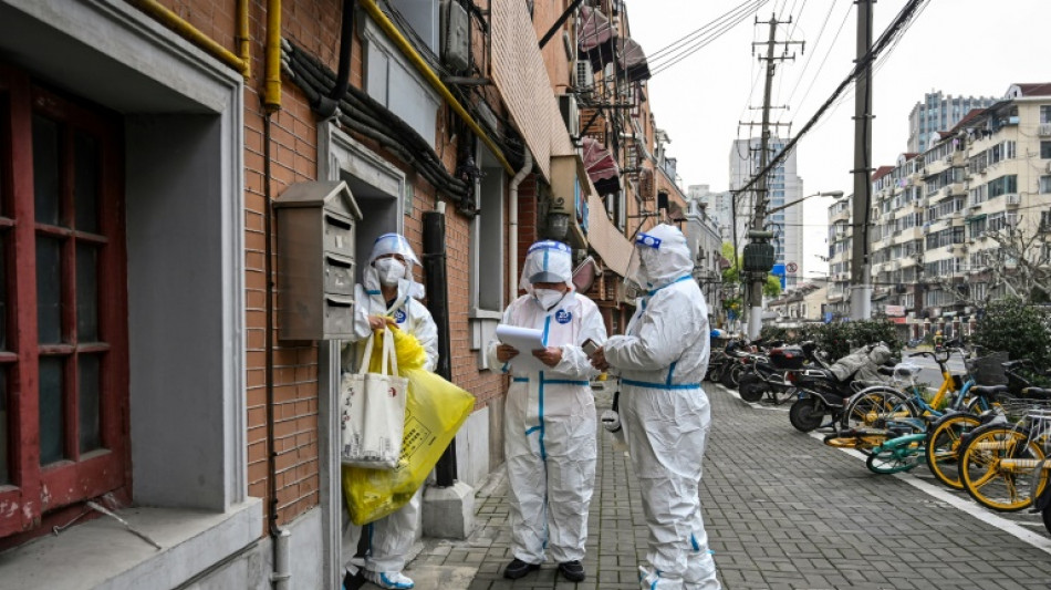 Shanghai to lock down in phases to rein in Covid-19 outbreak