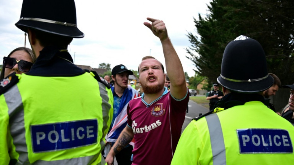 UK vows to speed up asylum claims as hotel protests spread