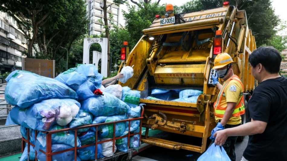 Taiwan's garbage trucks offer classical music and a catch-up