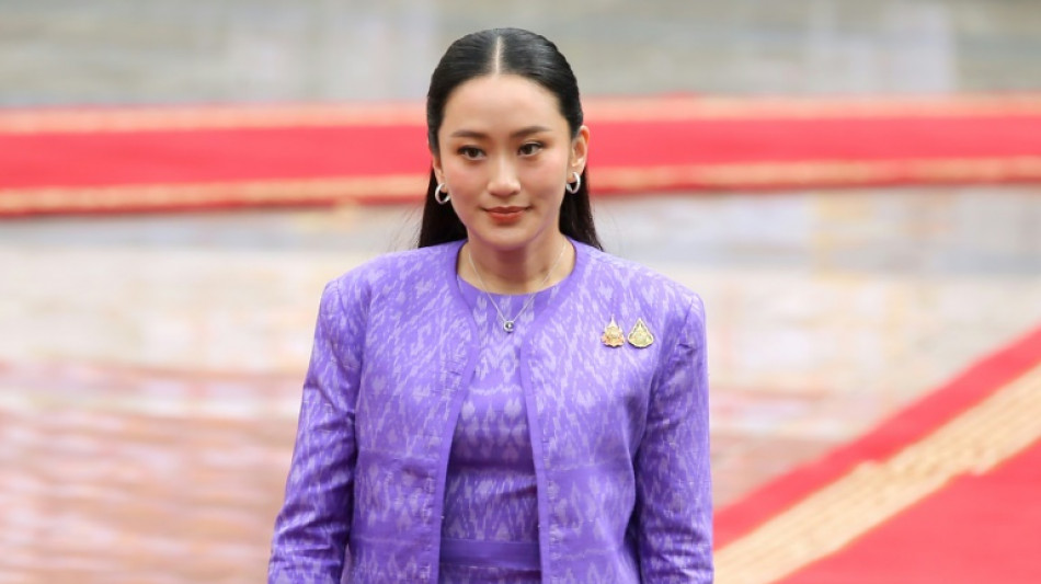 Thai PM apologises as crisis threatens to topple government