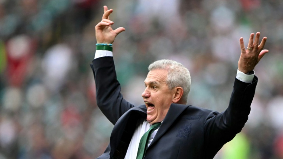 Aguirre says Mexico beat cramps and stage fright in World Cup opener
