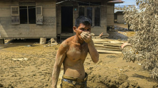 Starvation fears as more heavy rain threaten flood-ruined Indonesia