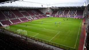 Hearts lead Old Firm as Scottish title race heads for tense finale