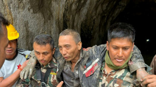 Two Nepal rescues revive hopes 10 days after flood