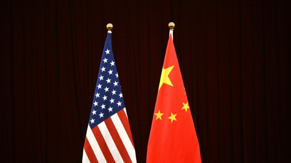 Chinese stocks, dollar rise before trade talks, Fed move