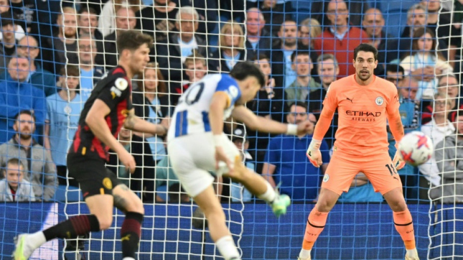Brighton end Man City's winning run to secure top-six finish