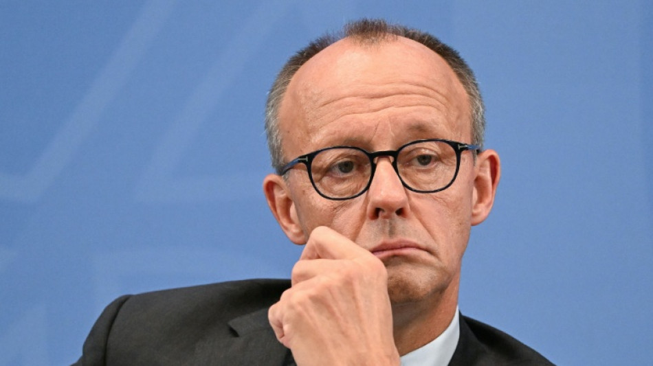 Merz to open Munich motor show as engine row threatens to combust