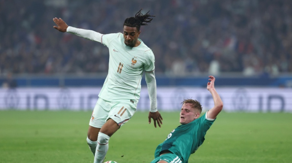Olise smashes hat-trick as France beat N. Ireland in pre-World Cup game