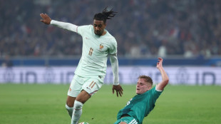 Olise smashes hat-trick as France beat N. Ireland in pre-World Cup game