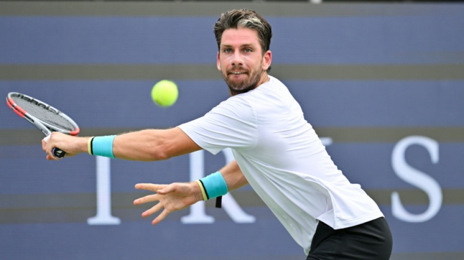 Battling Norrie survives match point to oust de Minaur 