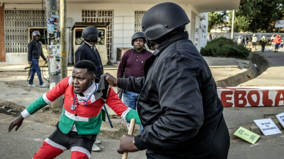 Kenyan police fire tear gas, make arrests at US Ebola centre protest