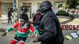 Kenyan police fire tear gas, make arrests at US Ebola centre protest