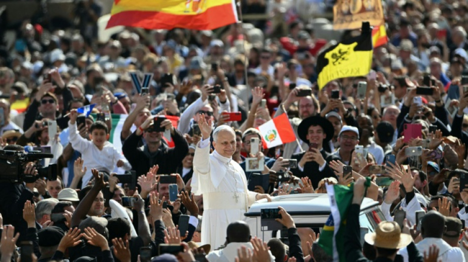 First US pope Leo XIV takes to popemobile ahead of inaugural mass