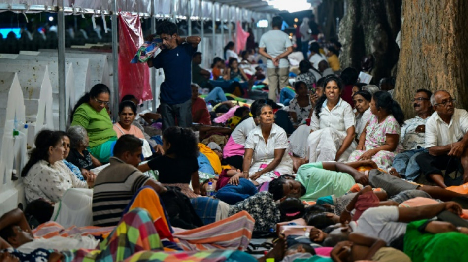 Sri Lankans throng to Kandy for rare display of Buddhist relic